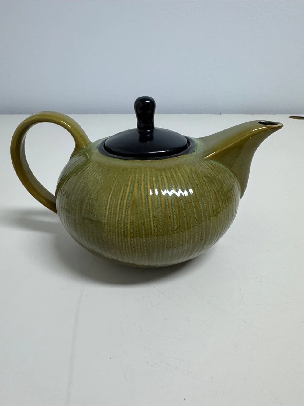 Gibson South Seas Collection Olive-Toned Ribbed Ceramic Teapot with Black Lid